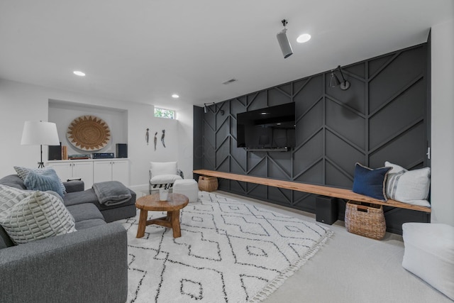 712 Riverbend Ave, Powell, OH 43065 - carpeted living room featuring recessed lighting