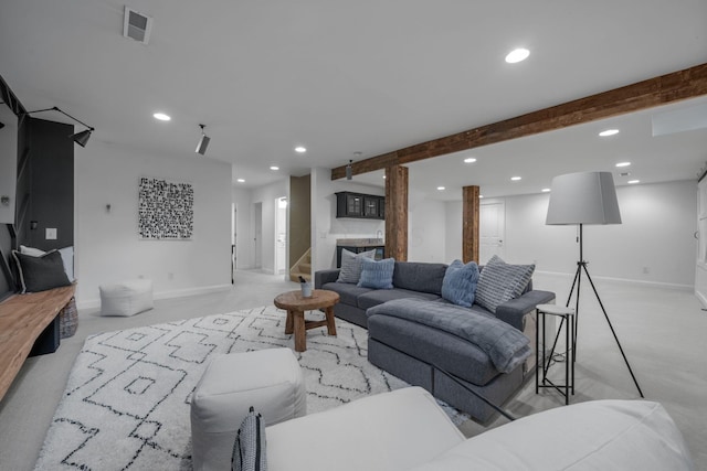 712 Riverbend Ave, Powell, OH 43065 - living room featuring recessed lighting, light colored carpet, beam ceiling, and baseboards