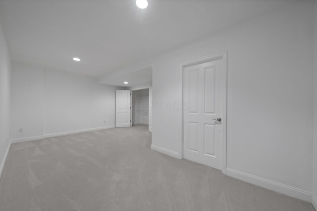 712 Riverbend Ave, Powell, OH 43065 - finished basement with light colored carpet, baseboards, and recessed lighting