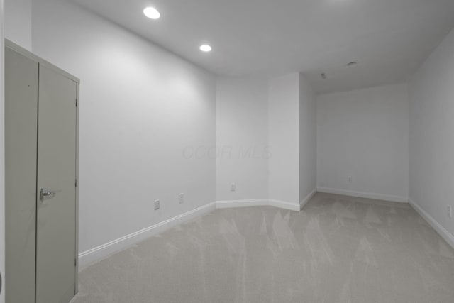 712 Riverbend Ave, Powell, OH 43065 - unfurnished room featuring light carpet, recessed lighting, and baseboards
