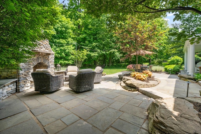 712 Riverbend Ave, Powell, OH 43065 - view of patio featuring an outdoor stone fireplace