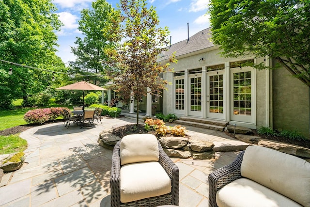 712 Riverbend Ave, Powell, OH 43065 - view of patio with outdoor dining space and french doors