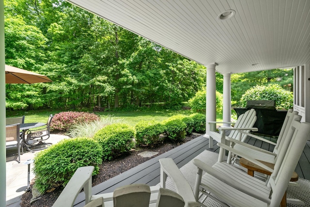 712 Riverbend Ave, Powell, OH 43065 - covered porch with outdoor dining space