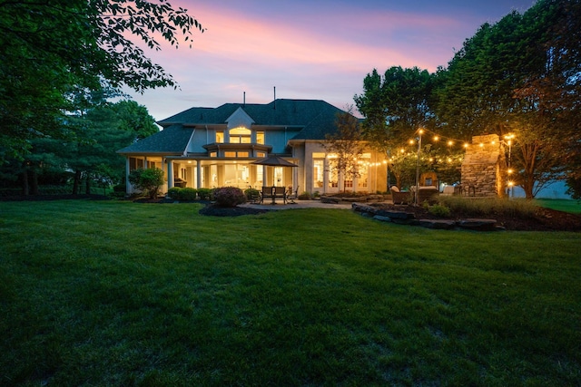712 Riverbend Ave, Powell, OH 43065 - back of house featuring a yard and a patio