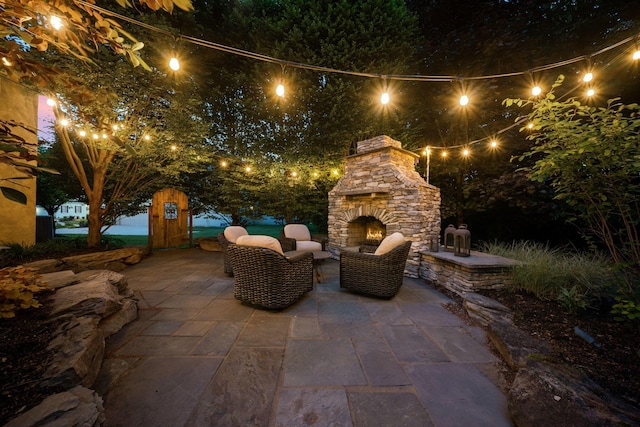 712 Riverbend Ave, Powell, OH 43065 - patio at twilight with a patio and an outdoor living space with a fireplace