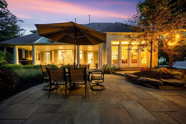 712 Riverbend Ave, Powell, OH 43065 - patio terrace at dusk featuring a patio area and outdoor dining space