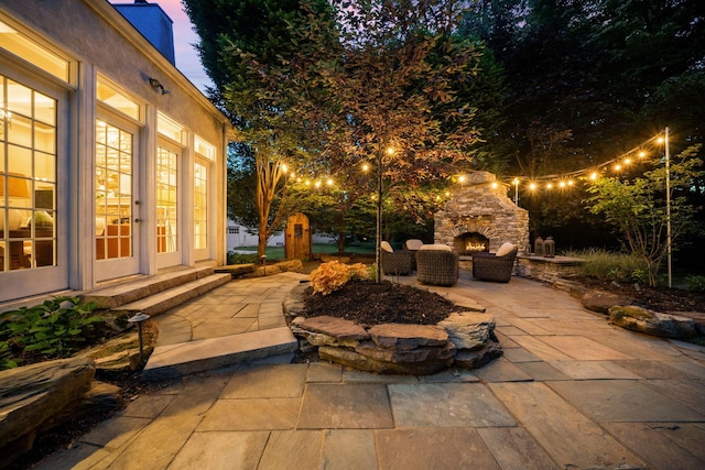 712 Riverbend Ave, Powell, OH 43065 - view of patio / terrace featuring an outdoor stone fireplace