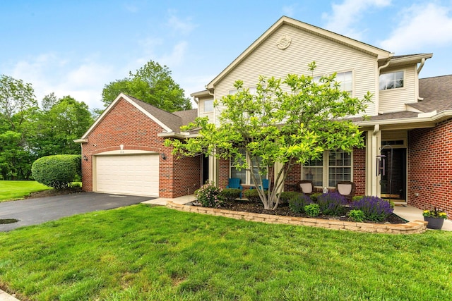 308 Postage Cir, Pickerington, OH 43147 - view of front facade with brick siding, asphalt driveway, a garage, a front yard, and roof with shingles