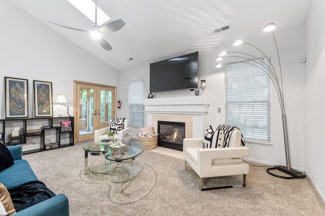 308 Postage Cir, Pickerington, OH 43147 - living room with french doors, a premium fireplace, ceiling fan, carpet floors, and baseboards