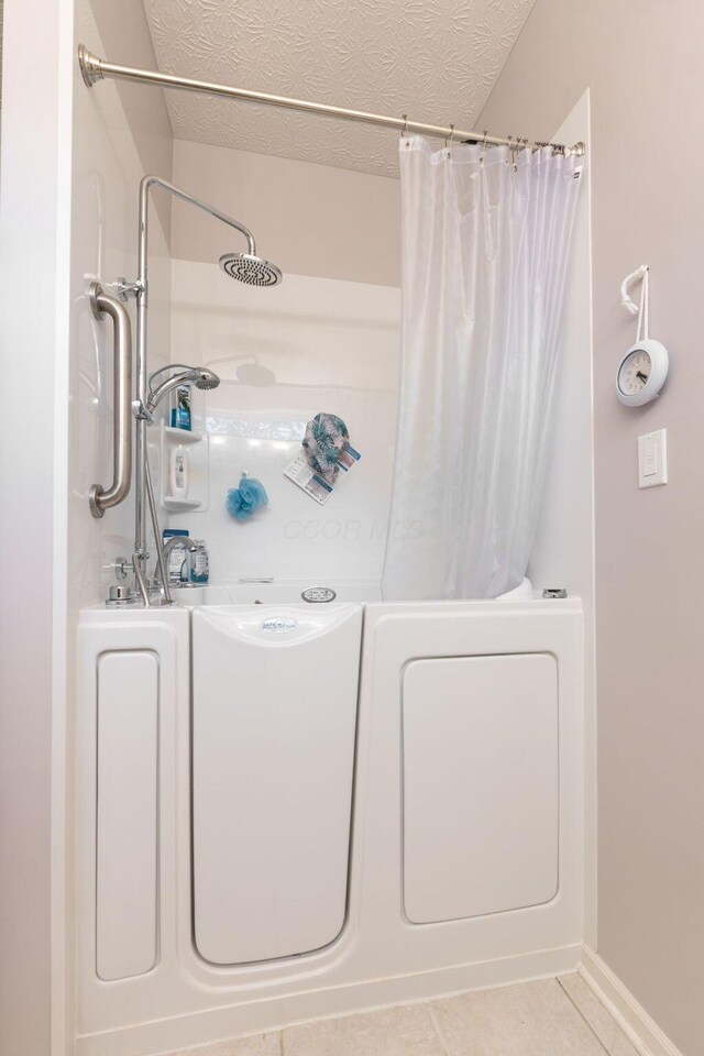308 Postage Cir, Pickerington, OH 43147 - bathroom featuring tile patterned floors and a textured ceiling