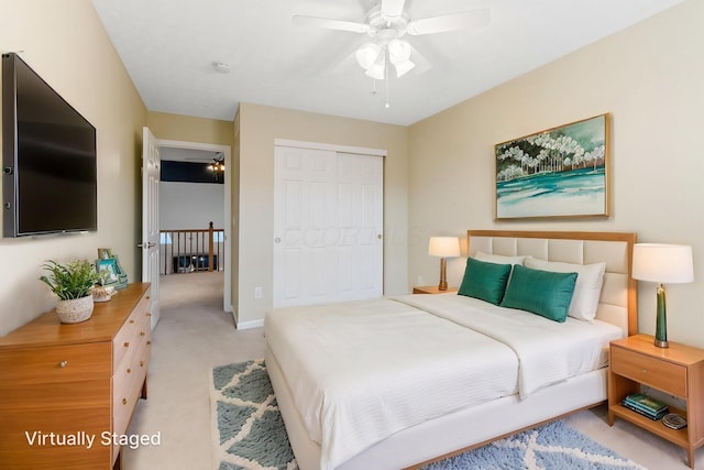 308 Postage Cir, Pickerington, OH 43147 - bedroom featuring a closet, light carpet, and ceiling fan