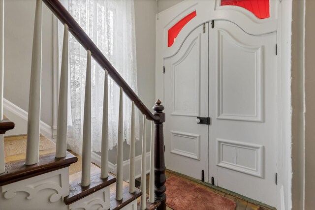 1625 Stringtown Rd NE, Lancaster, OH 43130 - stairs featuring tile patterned flooring
