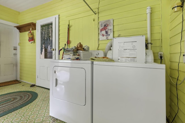 1625 Stringtown Rd NE, Lancaster, OH 43130 - laundry area with washer and clothes dryer and wood walls