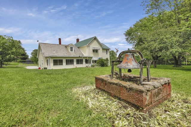 1625 Stringtown Rd NE, Lancaster, OH 43130 - back of property with a chimney and a lawn