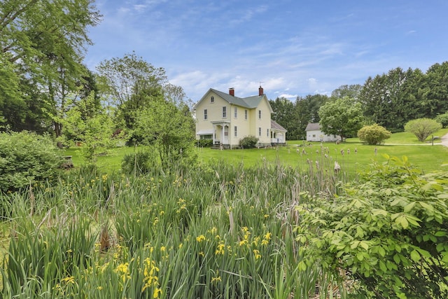 1625 Stringtown Rd NE, Lancaster, OH 43130 - view of home's exterior featuring a chimney