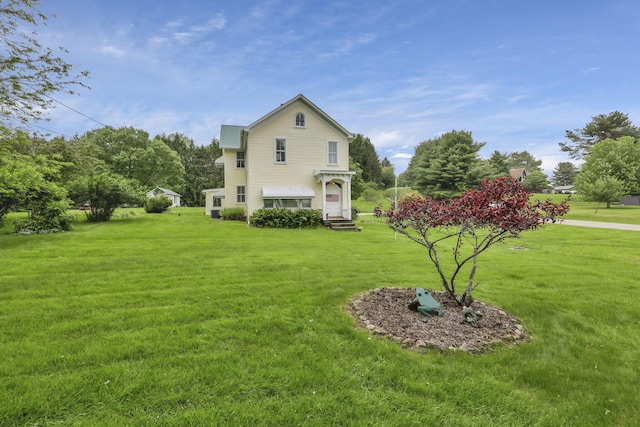 1625 Stringtown Rd NE, Lancaster, OH 43130 - view of home's exterior with a lawn