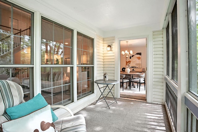 1223 Sanctuary Pl, Columbus, OH 43230 - sunroom / solarium with carpet floors and a chandelier