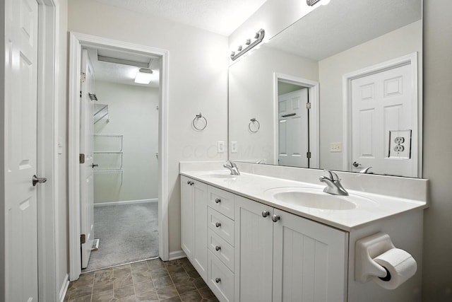 1223 Sanctuary Pl, Columbus, OH 43230 - full bathroom featuring double vanity and a textured ceiling