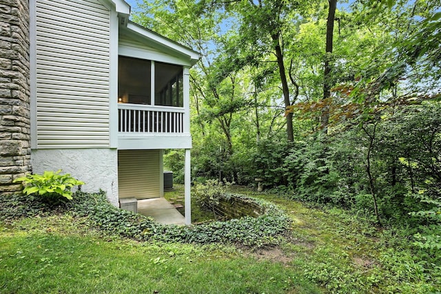 1223 Sanctuary Pl, Columbus, OH 43230 - exterior view of stone siding and a central air condition unit