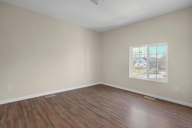 564-564 Kelton Ave, Columbus, OH 43205 - unfurnished room with dark wood finished floors and baseboards