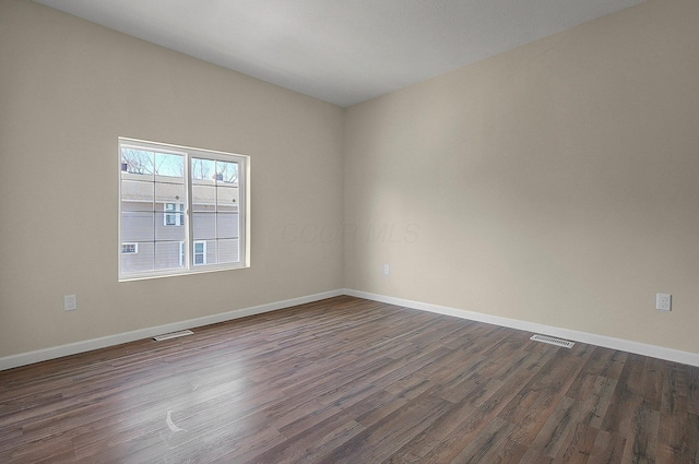 564-564 Kelton Ave, Columbus, OH 43205 - empty room with dark wood finished floors and baseboards