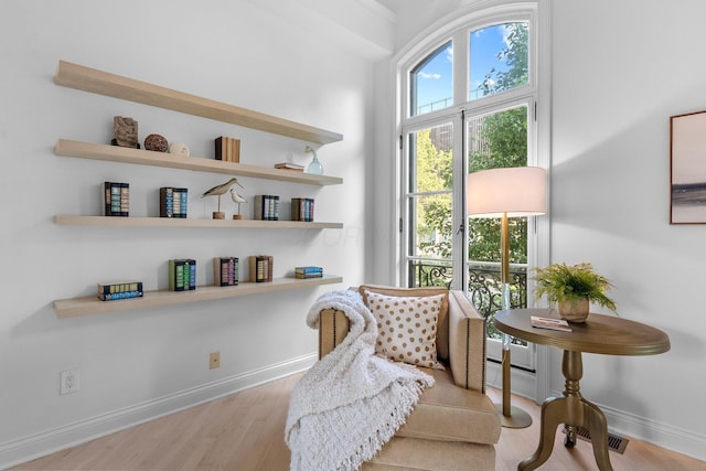382 E Town St, Columbus, OH 43215 - sitting room with wood finished floors and baseboards