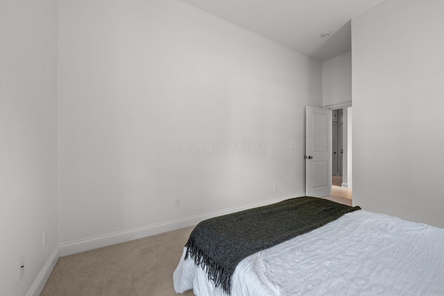 382 E Town St, Columbus, OH 43215 - bedroom featuring light colored carpet and baseboards