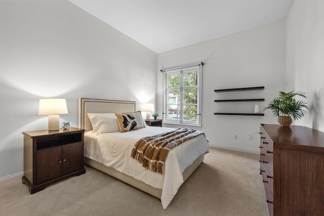 382 E Town St, Columbus, OH 43215 - bedroom featuring carpet flooring, vaulted ceiling, and baseboards