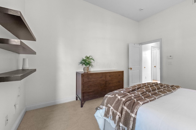 382 E Town St, Columbus, OH 43215 - bedroom featuring light colored carpet and baseboards