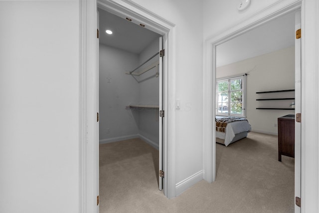 382 E Town St, Columbus, OH 43215 - walk in closet featuring light colored carpet