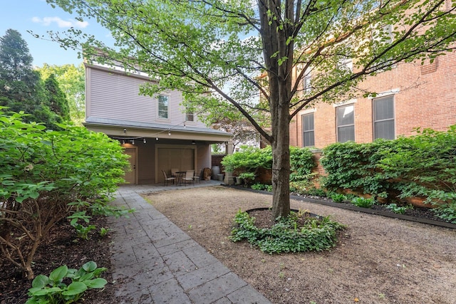 382 E Town St, Columbus, OH 43215 - view of yard with a patio and an attached garage