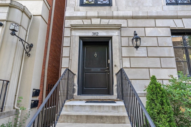 382 E Town St, Columbus, OH 43215 - view of exterior entry featuring stone siding