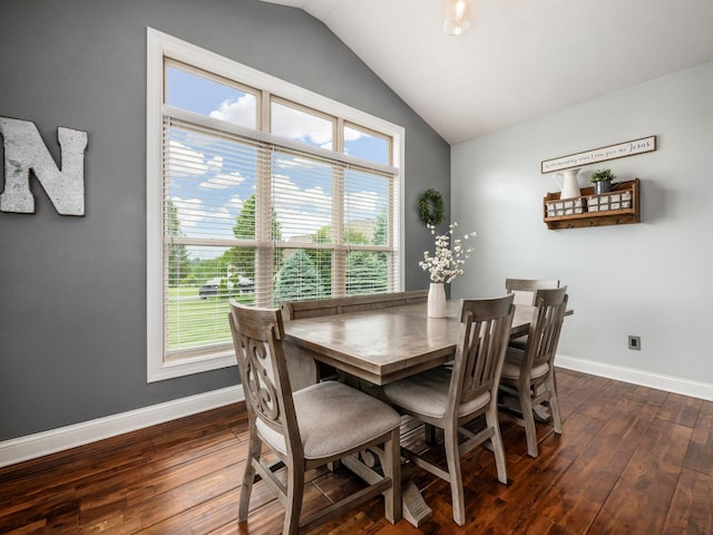 5046 Clark-Shaw Rd, Powell, OH 43065 - dining area featuring vaulted ceiling, dark wood-style floors, baseboards, and healthy amount of natural light