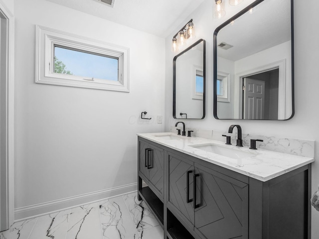 5046 Clark-Shaw Rd, Powell, OH 43065 - full bathroom with marble finish flooring, double vanity, and baseboards