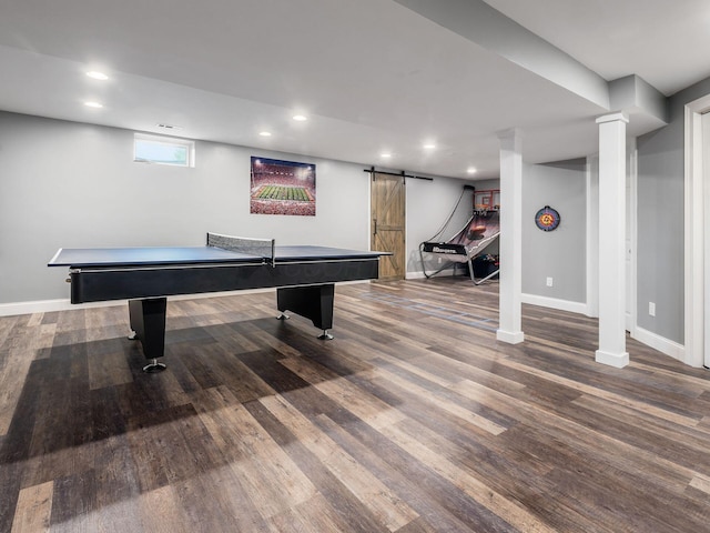 5046 Clark-Shaw Rd, Powell, OH 43065 - game room featuring a barn door, wood finished floors, baseboards, and recessed lighting