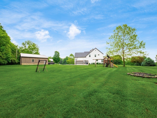 5046 Clark-Shaw Rd, Powell, OH 43065 - view of green lawn featuring a playground