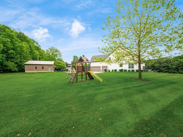 5046 Clark-Shaw Rd, Powell, OH 43065 - view of green lawn with a playground