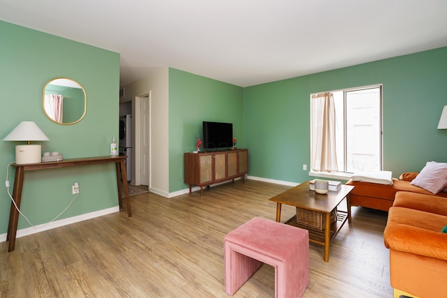 277 Lear St Unit 11, Columbus, OH 43206 - living room featuring wood finished floors and baseboards