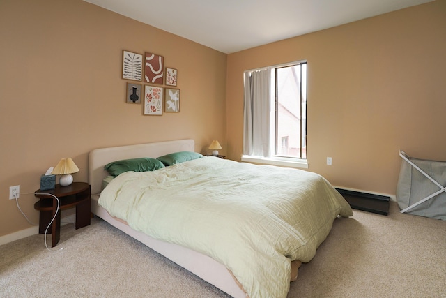 277 Lear St Unit 11, Columbus, OH 43206 - bedroom with carpet flooring, baseboard heating, and baseboards