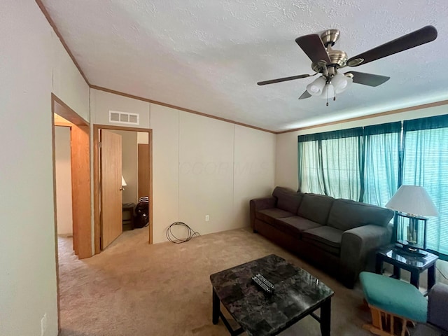 1282 Redman Ave, Mansfield, OH 44905 - carpeted living area with ornamental molding, a ceiling fan, a textured ceiling, and vaulted ceiling