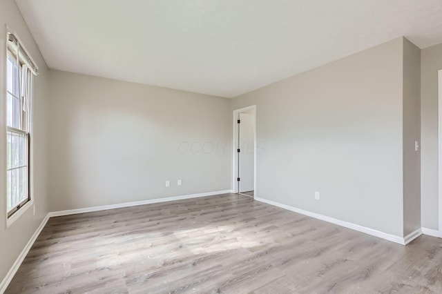 1041 Clifton Chase Dr, Galloway, OH 43119 - unfurnished room featuring wood finished floors and baseboards