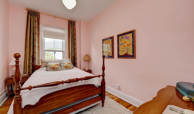 758 S Front St, Columbus, OH 43206 - bedroom with baseboards and wood finished floors