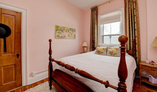 758 S Front St, Columbus, OH 43206 - bedroom featuring wood finished floors and baseboards