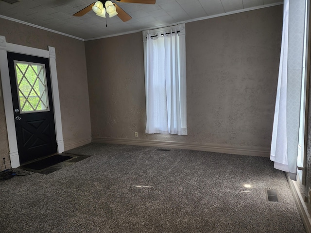 7703 County Road 91, Lewistown, OH 43333 - carpeted spare room with crown molding, a ceiling fan, and baseboards