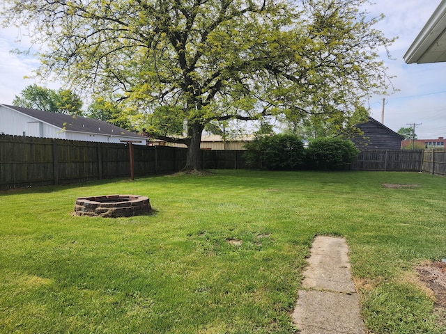 7703 County Road 91, Lewistown, OH 43333 - view of yard featuring a fire pit