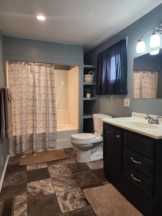 7703 County Road 91, Lewistown, OH 43333 - bathroom featuring toilet, vanity, stone finish flooring, and shower / tub combo