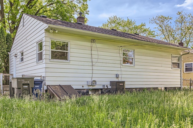 4309 Walford St, Columbus, OH 43224 - rear view of property with a chimney