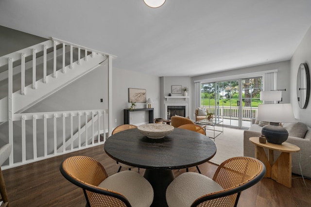 5394 Ambrosia Ave Unit 21B, Columbus, OH 43235 - dining room featuring wood finished floors and a fireplace