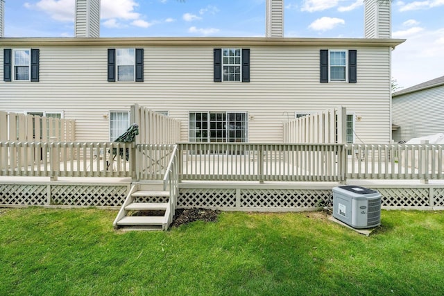 5394 Ambrosia Ave Unit 21B, Columbus, OH 43235 - rear view of property featuring a lawn and a deck