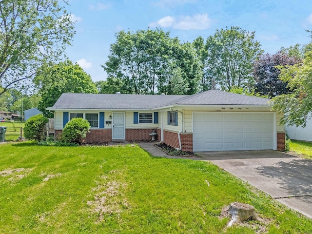 4861 Warminster Dr, Columbus, OH 43232 - single story home with brick siding, a garage, and driveway